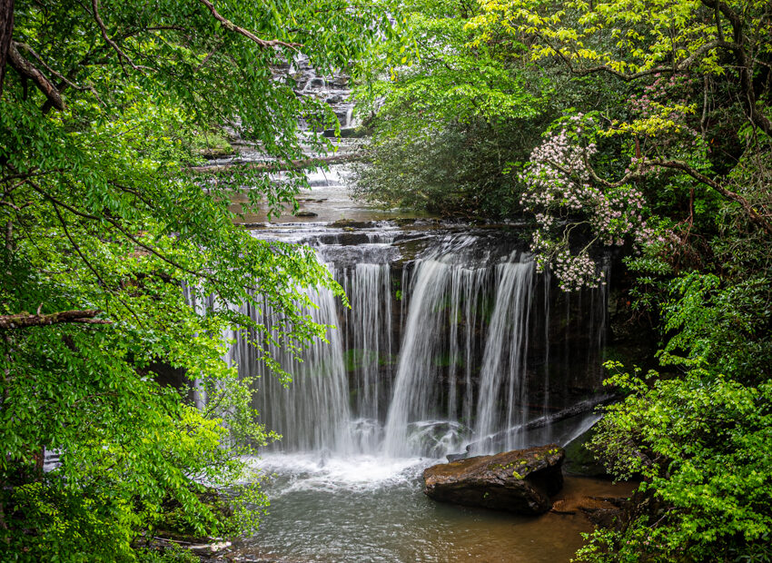 Waterfall cascading over rocks during spring